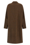 the maison margiela oversized cocooning coat redefines the proportions of the ou