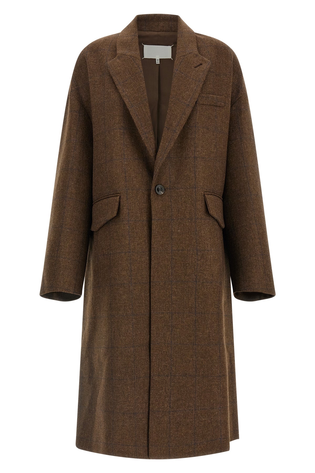 the maison margiela oversized cocooning coat redefines the proportions of the ou