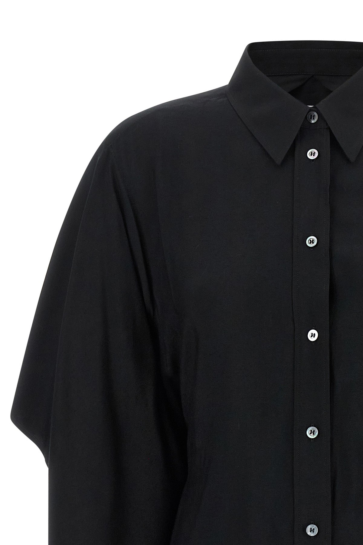 the maison margiela shirt redefines the codes of classic tailoring through a hyb