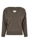 the maison margiela lived-in jersey redefines contemporary knitwear through a de