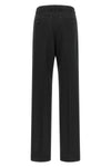 maison margiela trousers define a new sartorial proportion through a wide and st