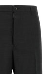 maison margiela trousers define a new sartorial proportion through a wide and st
