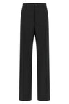 maison margiela trousers define a new sartorial proportion through a wide and st