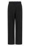 loose trousers loewe set a new standard for relaxed tailoring through precise co