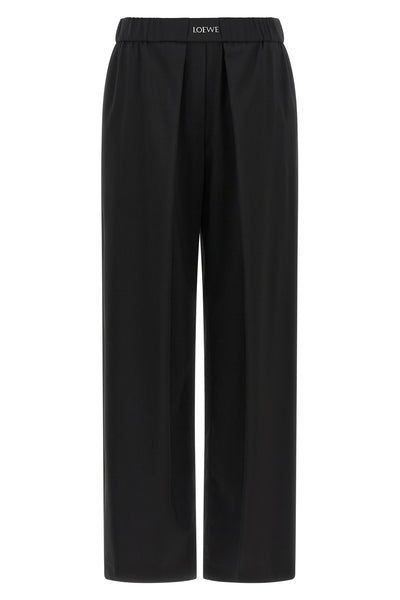loose trousers loewe set a new standard for relaxed tailoring through precise co
