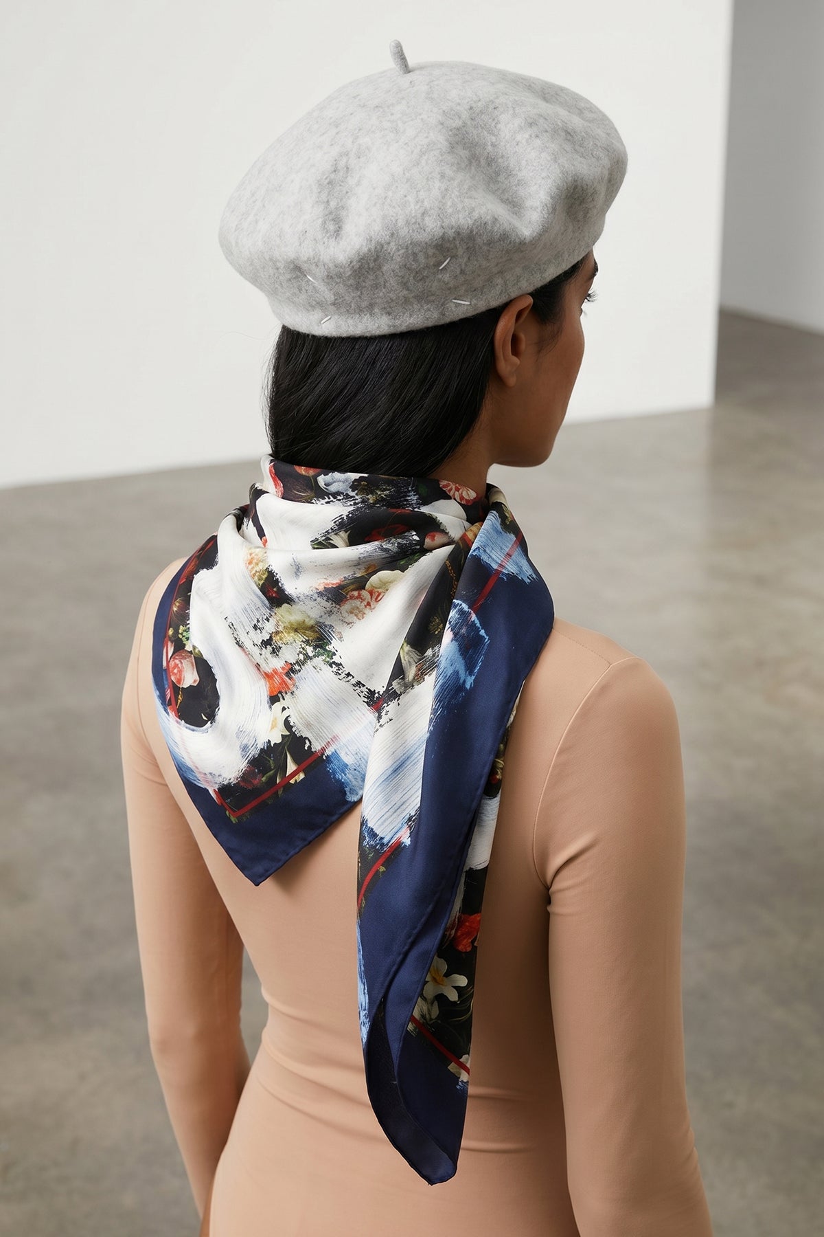 the maison margiela cap reinterprets a wardrobe classic through the maisons dec