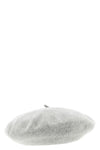 the maison margiela cap reinterprets a wardrobe classic through the maisons dec