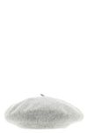 the maison margiela cap reinterprets a wardrobe classic through the maisons dec