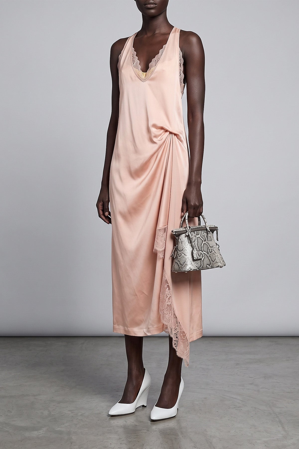 the maison margiela silk lace slip midi dress redefines the codes of deconstruct