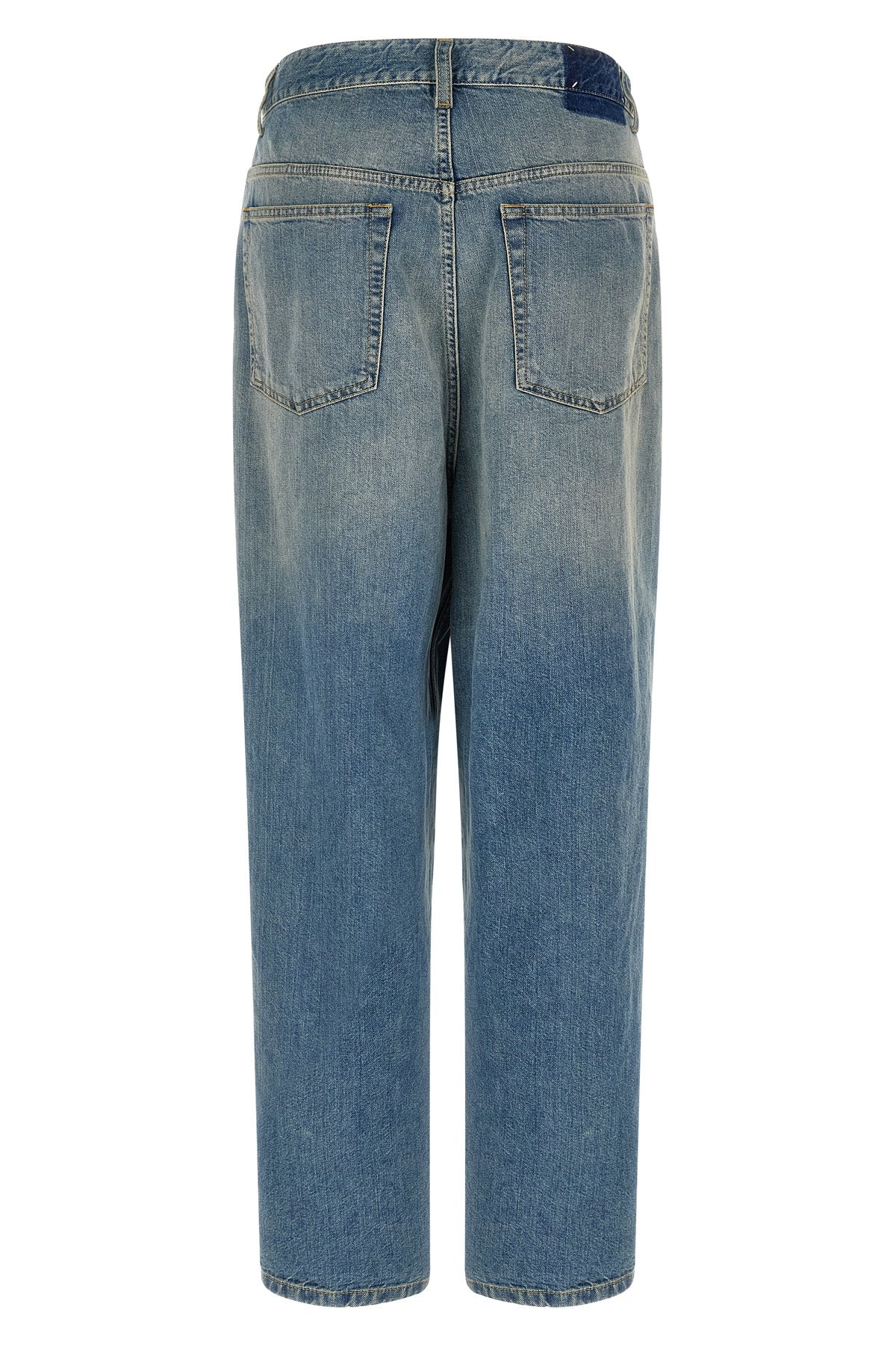 maison margiela jeans redefine the codes of denim through a deconstructed and in