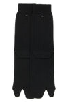 maison margielas black wool blend socks redefine the daily accessory through th