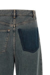 maison margiela mm6 jeans redefine traditional denim through an avant-garde back