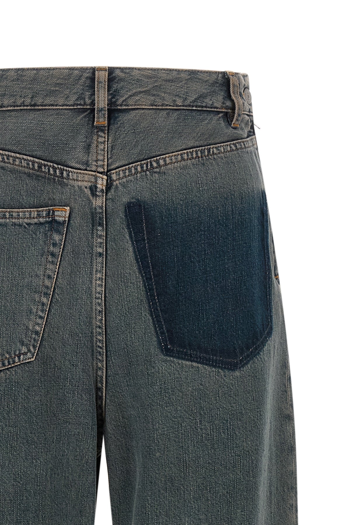maison margiela mm6 jeans redefine traditional denim through an avant-garde back