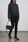 the loewe jacket redefines the codes of outerwear through a relaxed silhouette a