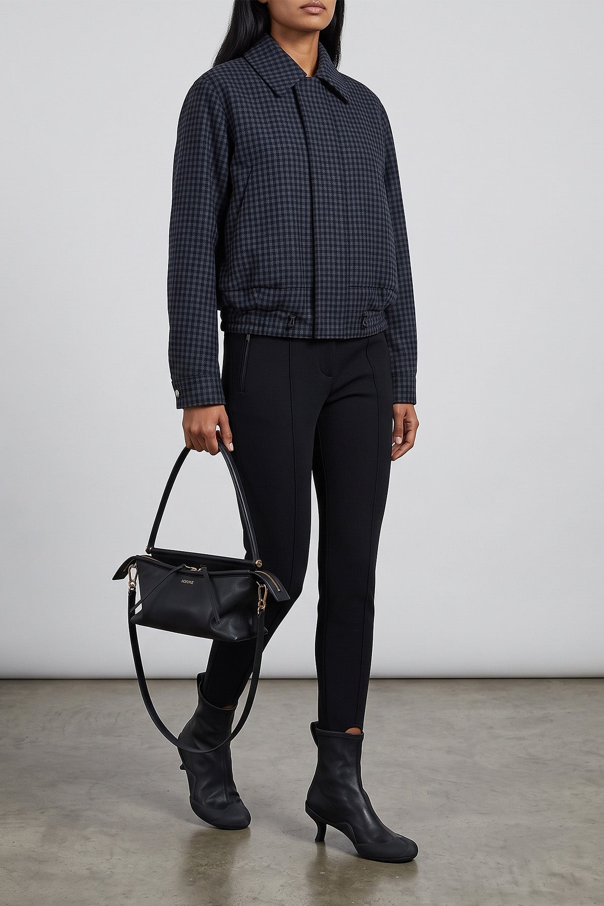 the loewe jacket redefines the codes of outerwear through a relaxed silhouette a