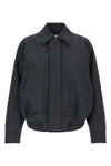 the loewe jacket redefines the codes of outerwear through a relaxed silhouette a