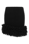 the mini skirt loewe redefines the codes of knitwear through a tight and sculptu