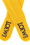 loewe high socks redefine the everyday accessory through a vibrant yellow hue an