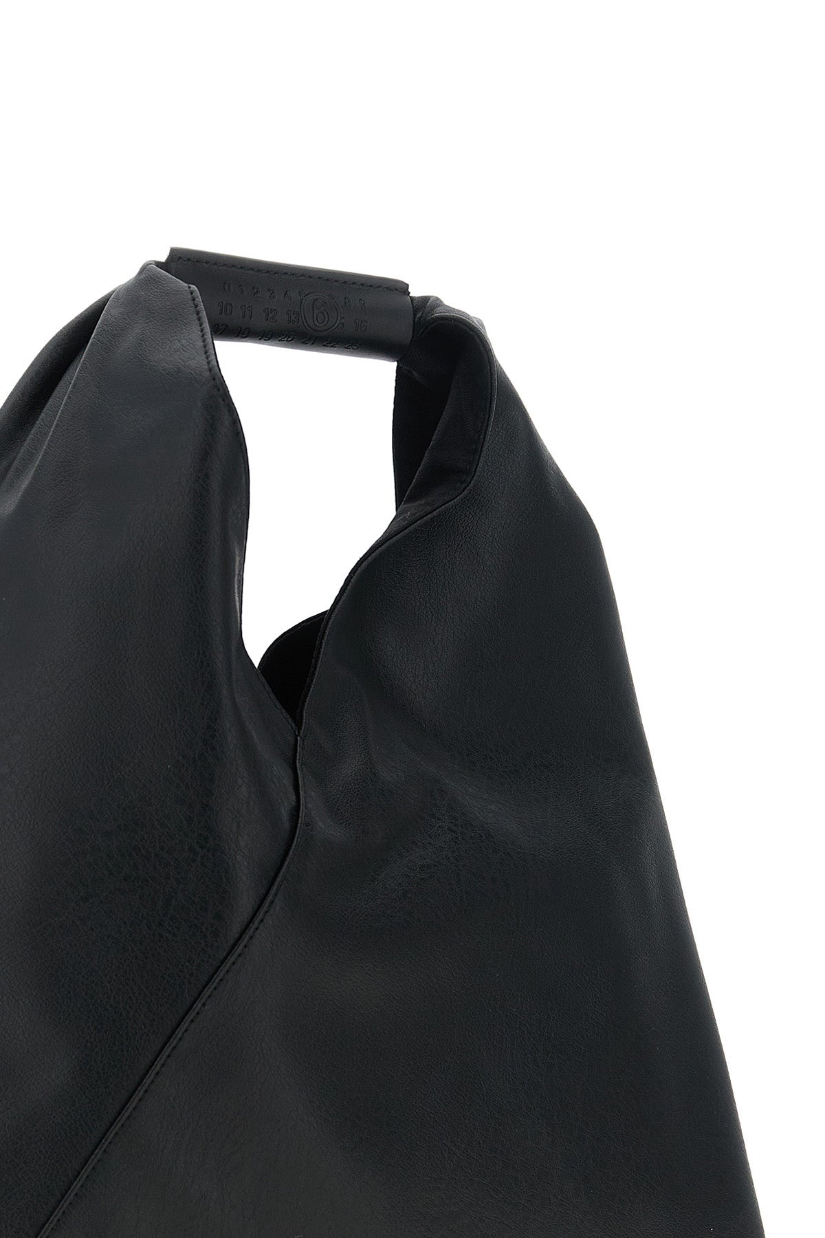 the black maison margiela japanese classic small mm6 handbag stands out for it