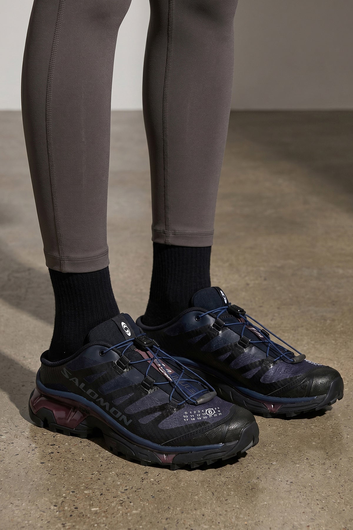 the mm6 maison margiela x salomon xt4 mule sneaker reinterprets the iconic out