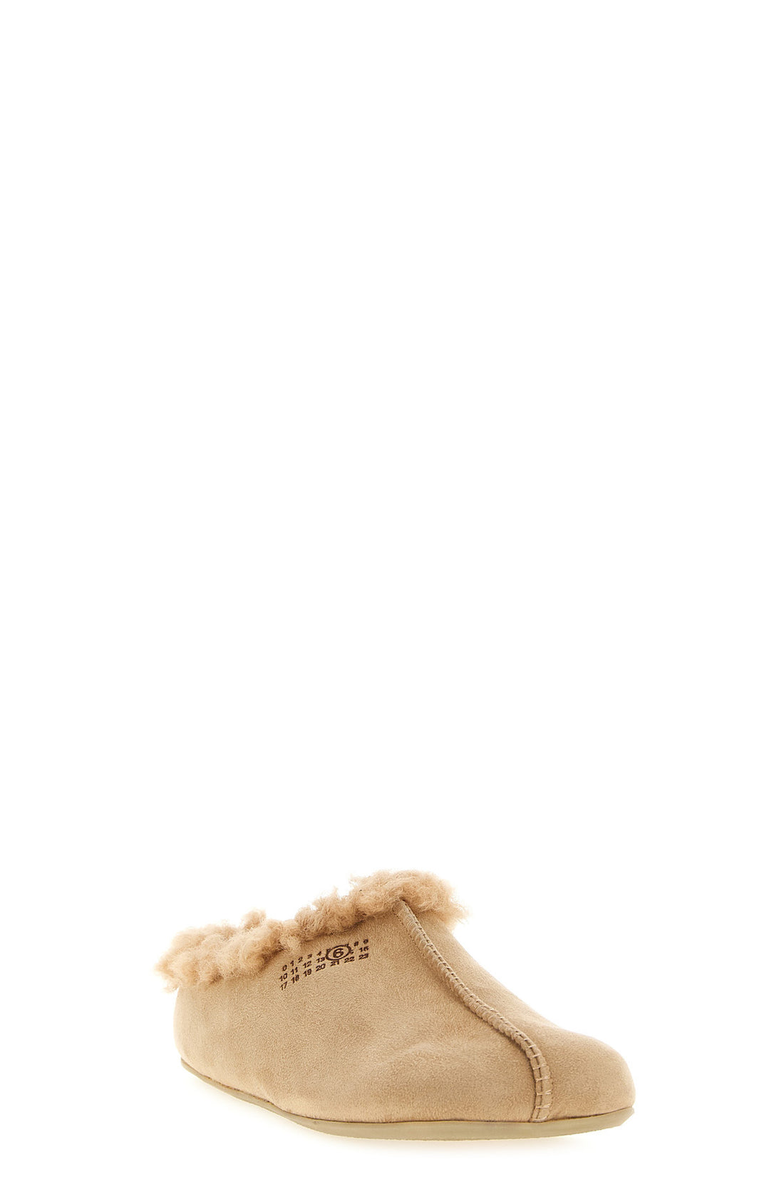 MM6 37 the maison margiela mm6 sabot redefines the concept of slip-on footwear through