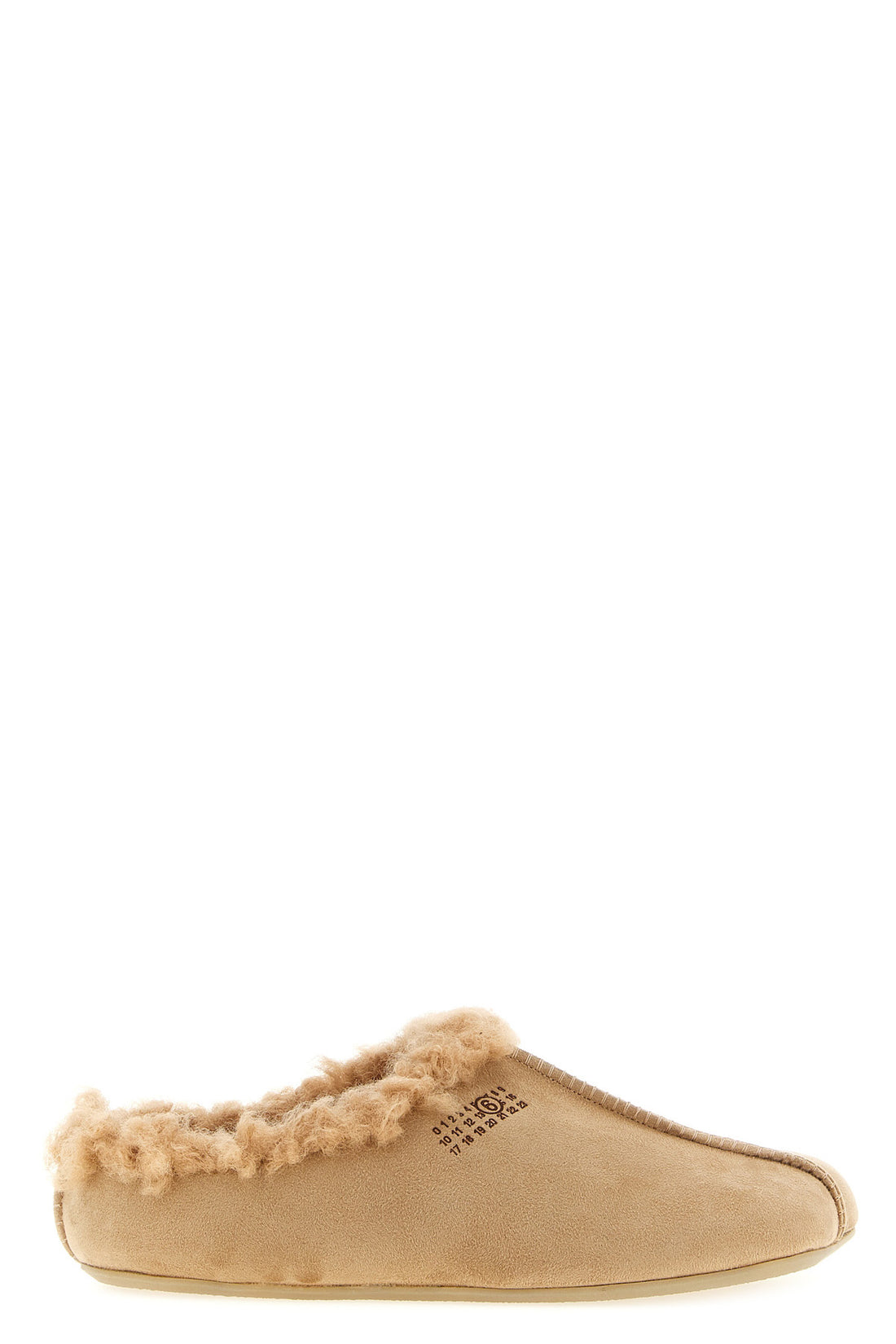 MM6 37 the maison margiela mm6 sabot redefines the concept of slip-on footwear through