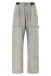 maison margiela mm6 jeans redefine utility clothing codes through a deconstructe