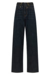 maison margiela mm6 jeans redefine the codes of dark blue denim through a decons