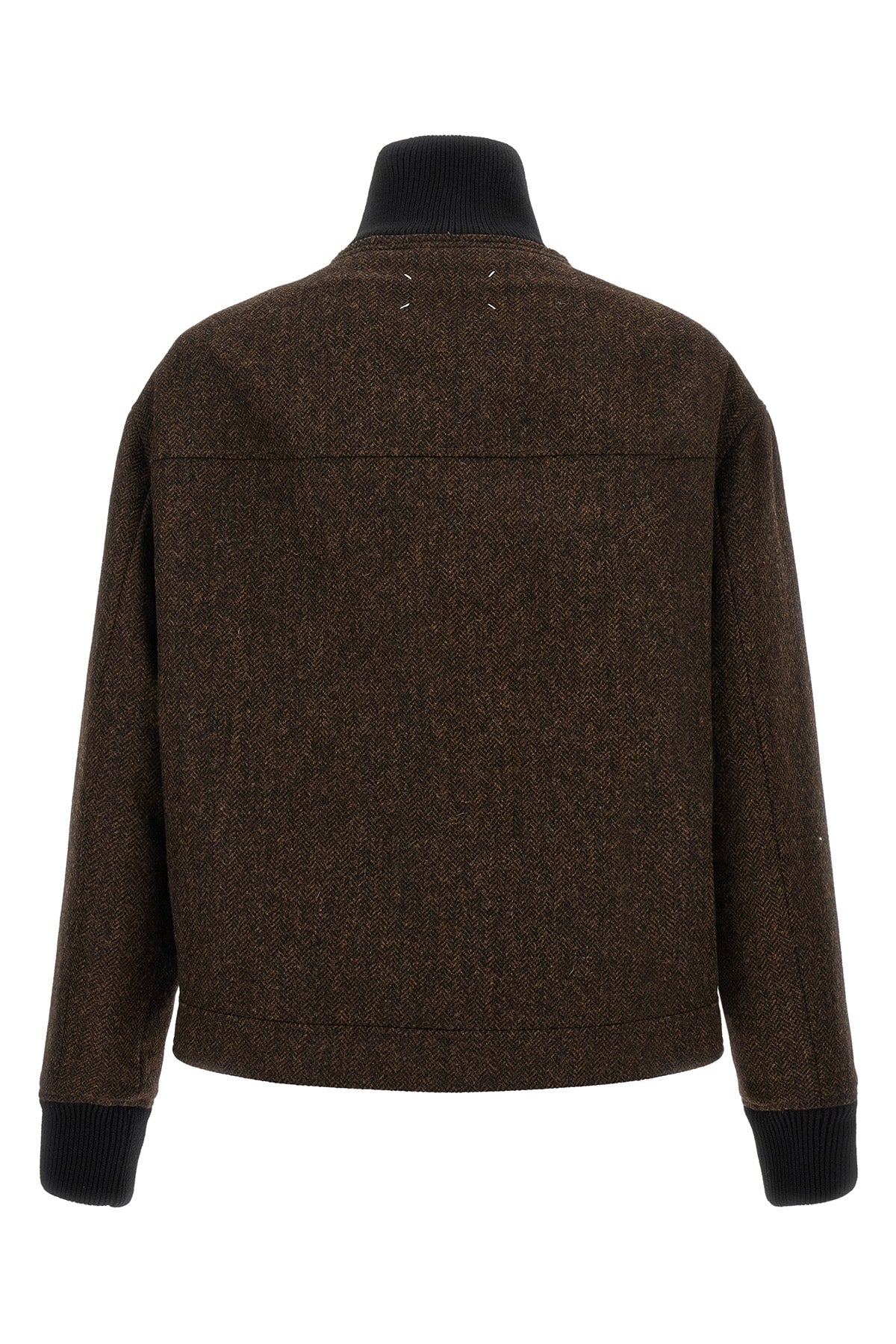 the maison margiela bomber jacket explores the technique of assemblage by combin