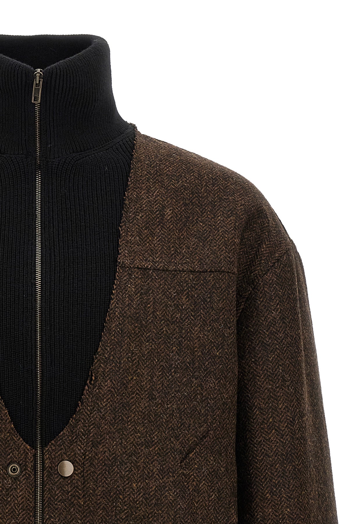 the maison margiela bomber jacket explores the technique of assemblage by combin