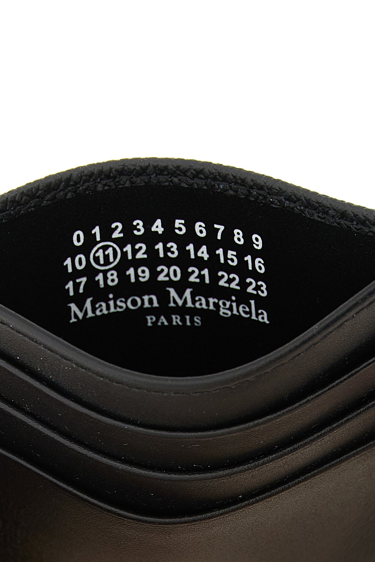maison margiela features a structured silhouette