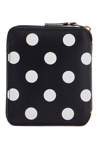 black leather wallet with white polka dots and gold zip