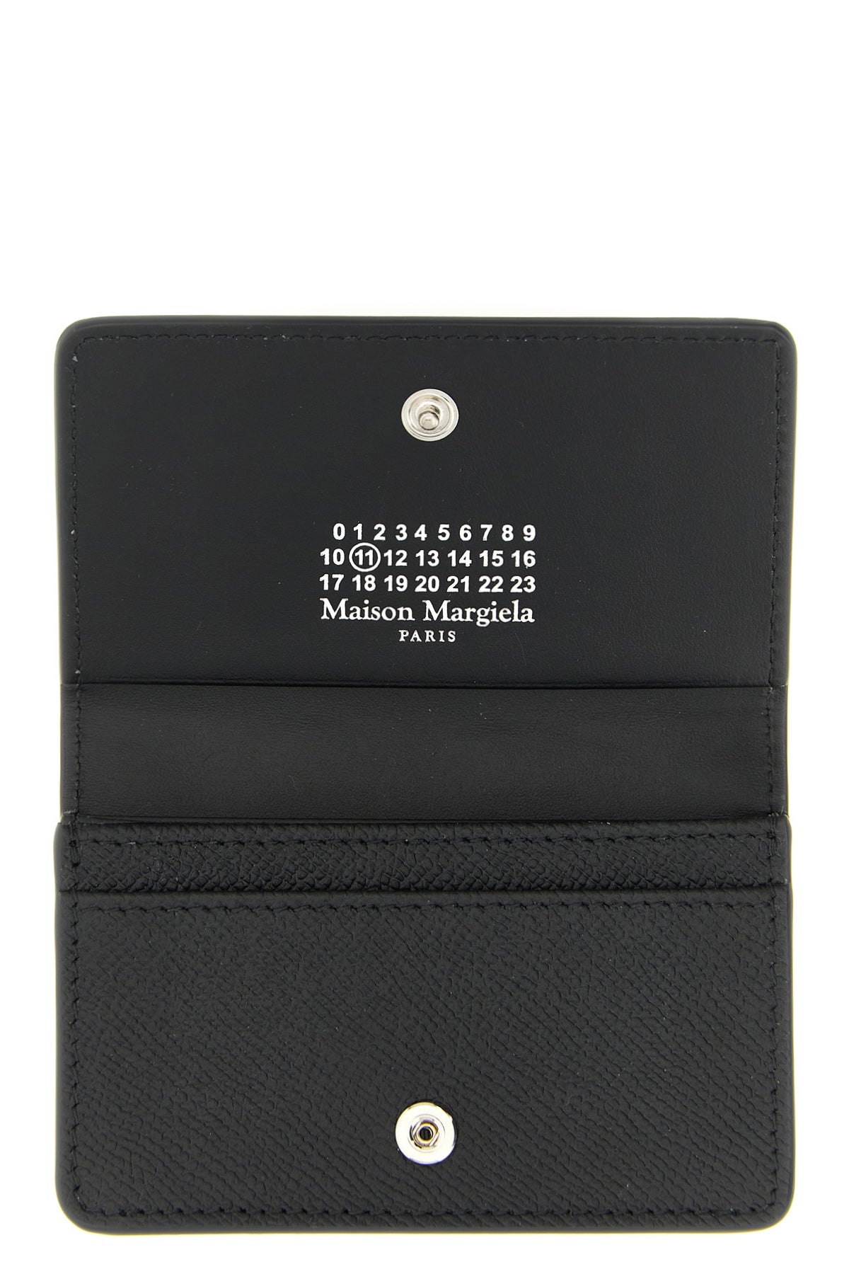 the maison margiela cardholder redefines small leather goods through a minimal a