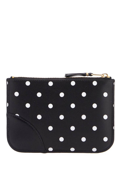 compact black polka dot wallet