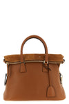 maison margiela 5ac soft medium shoulder bag explores the concept of deconstru