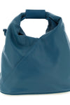 maison margielas mm6 japanese crossbody bag defines space through a rigorous