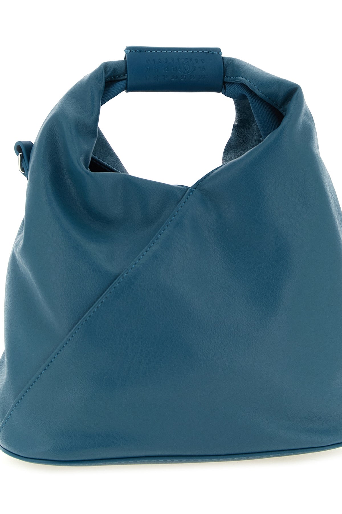 maison margielas mm6 japanese crossbody bag defines space through a rigorous