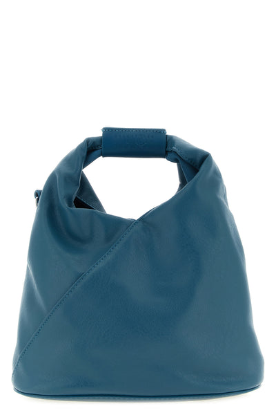 maison margielas mm6 japanese crossbody bag defines space through a rigorous