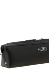 the maison margiela mm6 clutch redefines the codes of everyday accessories throu