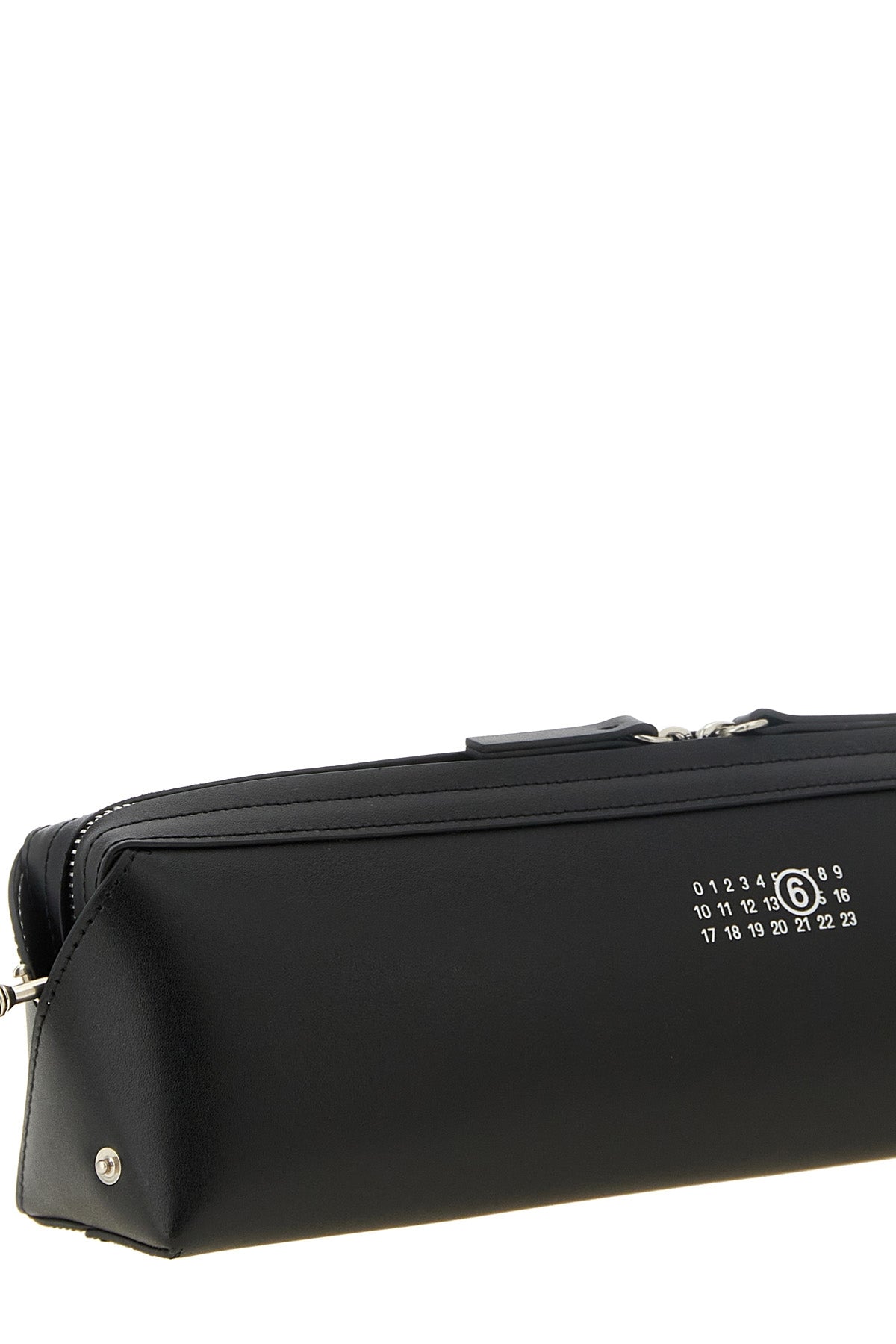 the maison margiela mm6 clutch redefines the codes of everyday accessories throu