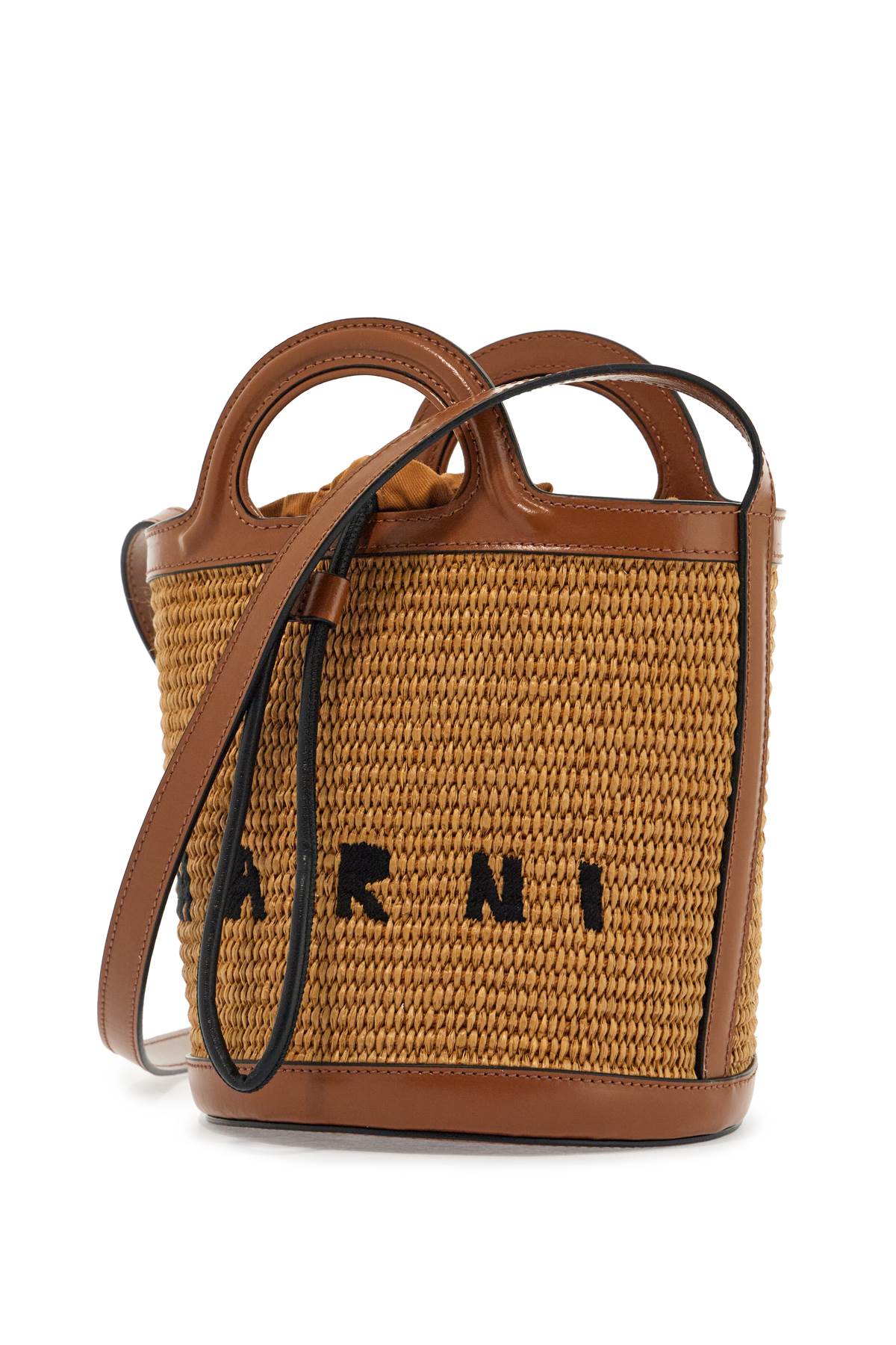 light brown woven fabric and leather bag with circular handles