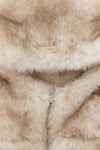 the herno hooded collar redefines winter accessories through a luxurious and fun