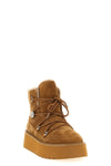 the pinko martina ankle boots redefine winter proportions through a structured