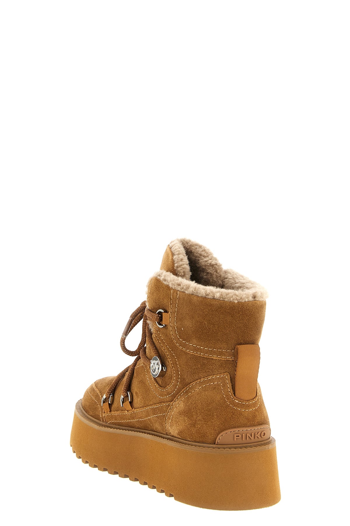 the pinko martina ankle boots redefine winter proportions through a structured
