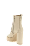 the pinko clara 01 ankle boots redefine urban volumes through a rigorous constru
