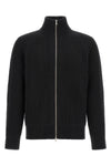 the maison margiela mm6 knitted jacket defines contemporary layering through a s