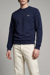 the lacoste sweatshirt establishes the foundations of casual sophistication thro
