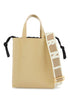 beige leather shopping bag with short handles and shoulder strap