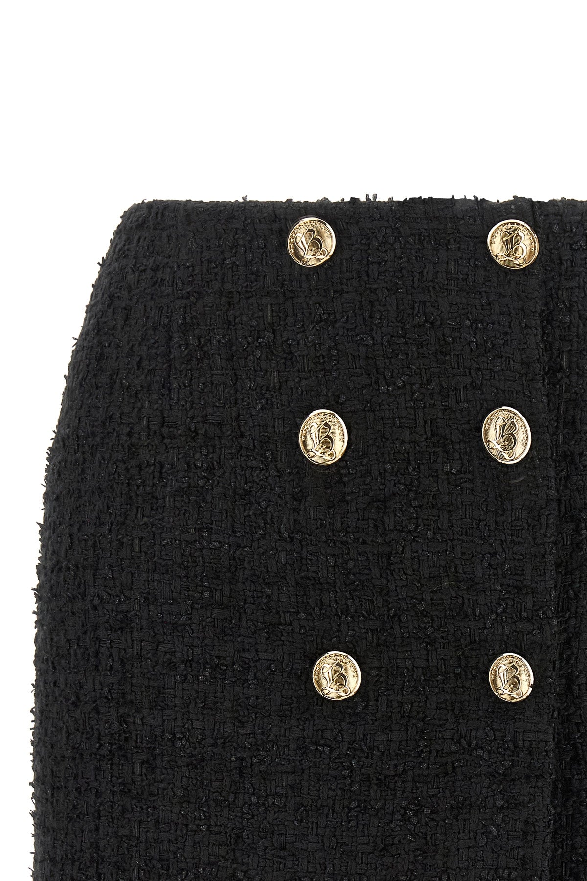 the balmain mini skirt in bouclé cotton blend redefines the codes of contemporar