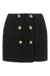 the balmain mini skirt in bouclé cotton blend redefines the codes of contemporar